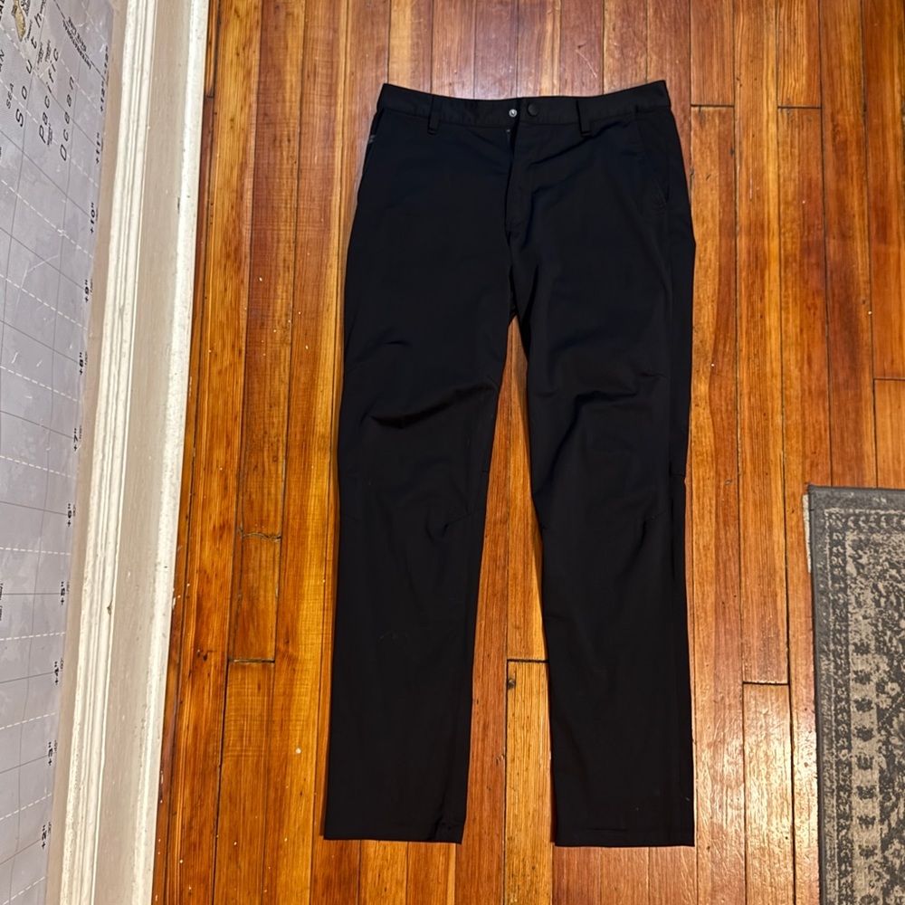 Used Men's Rhône commuter pants size 31
